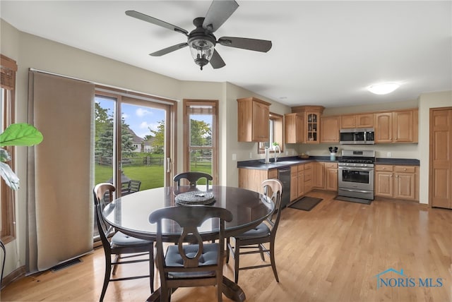 4729 Talon Trl, Maumee, OH 43537 - dining area featuring light wood-style floors and ceiling fan