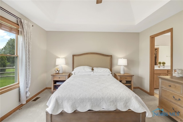 4729 Talon Trl, Maumee, OH 43537 - bedroom with light colored carpet, baseboards, and ensuite bath