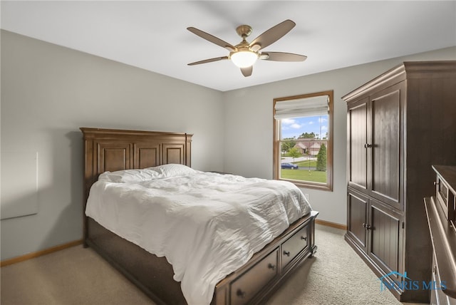4729 Talon Trl, Maumee, OH 43537 - bedroom with light colored carpet, baseboards, and a ceiling fan