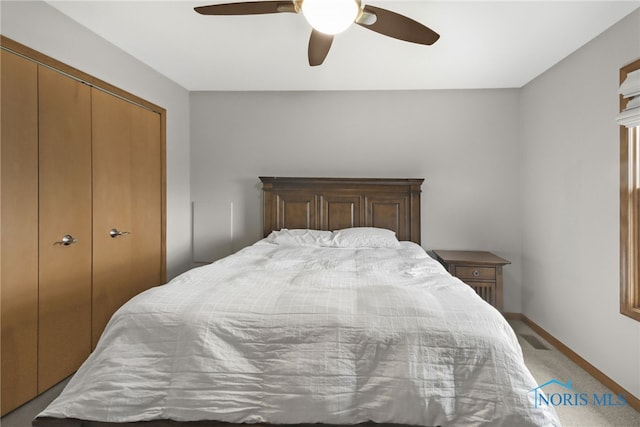 4729 Talon Trl, Maumee, OH 43537 - bedroom featuring light carpet, baseboards, ceiling fan, and a closet