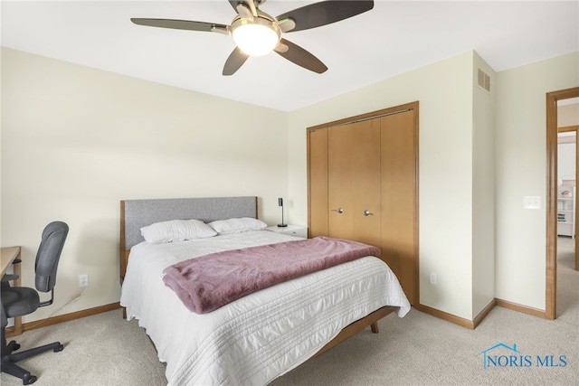 4729 Talon Trl, Maumee, OH 43537 - bedroom featuring light carpet, baseboards, a closet, and a ceiling fan