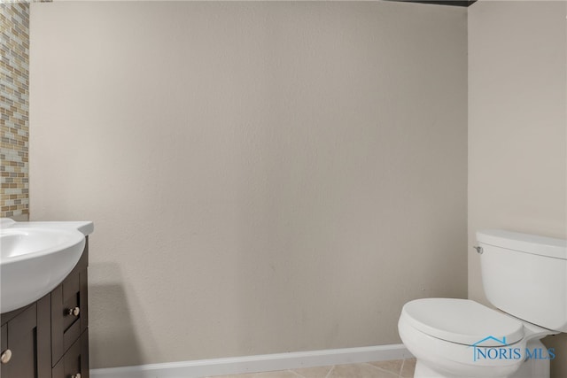 4729 Talon Trl, Maumee, OH 43537 - half bath featuring vanity, toilet, baseboards, and tile patterned flooring