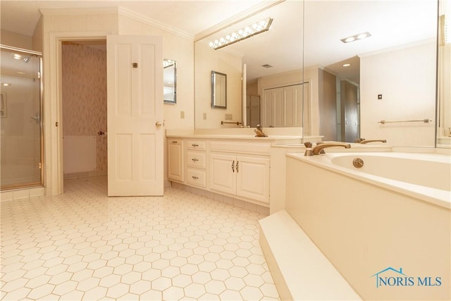 5831 Monroe St Unit 602, Sylvania, OH 43560 - bathroom featuring vanity, crown molding, a stall shower, and a bath