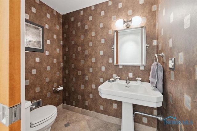 2256 Barrington Dr, Toledo, OH 43606 - bathroom with tile patterned floors, baseboards, and toilet