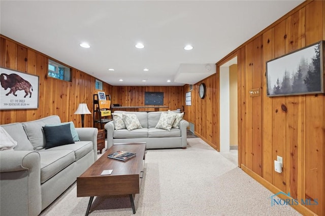 2256 Barrington Dr, Toledo, OH 43606 - living area with wood walls, recessed lighting, light carpet, and baseboards