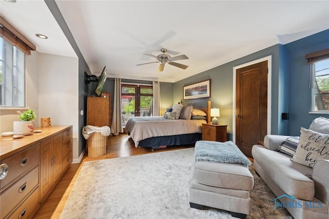 2256 Barrington Dr, Toledo, OH 43606 - bedroom featuring light wood-type flooring, baseboards, and a ceiling fan