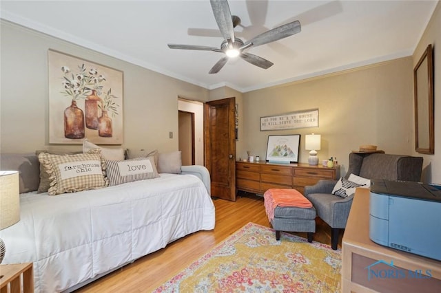 2256 Barrington Dr, Toledo, OH 43606 - bedroom featuring wood finished floors, ornamental molding, and a ceiling fan
