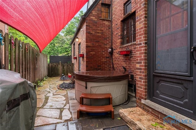 2256 Barrington Dr, Toledo, OH 43606 - view of patio / terrace featuring a hot tub