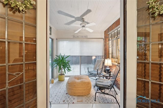 2256 Barrington Dr, Toledo, OH 43606 - sunroom with a ceiling fan and tile patterned flooring