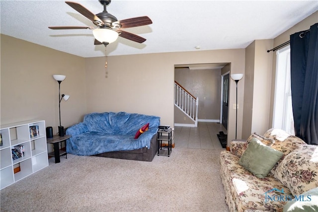 1500 S Jackson Ave, Defiance, OH 43512 - living room with a ceiling fan, stairs, carpet, and baseboards