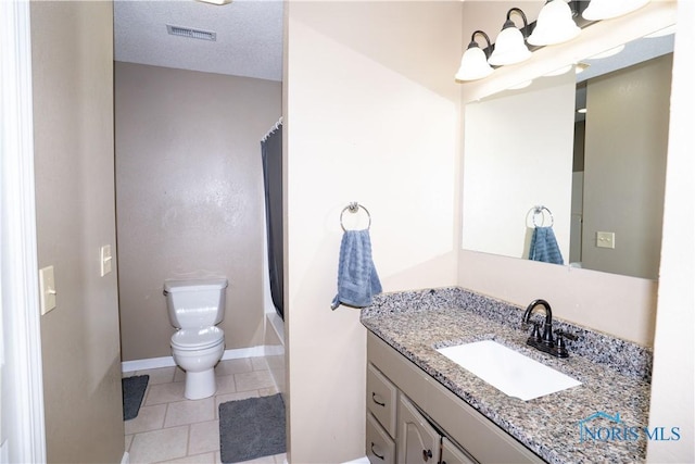 1500 S Jackson Ave, Defiance, OH 43512 - full bathroom featuring vanity, toilet, tile patterned floors, baseboards, and shower / tub combo