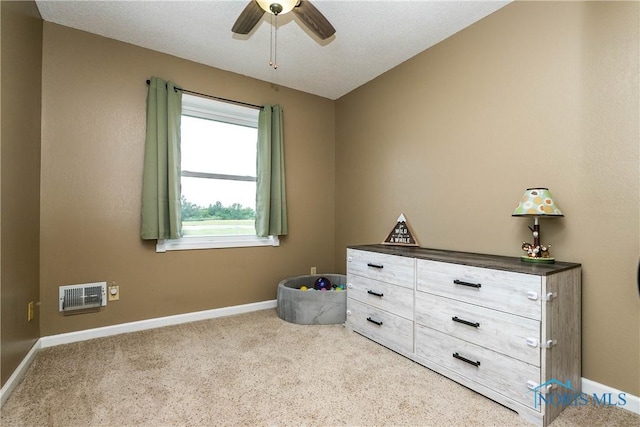 1500 S Jackson Ave, Defiance, OH 43512 - carpeted bedroom featuring baseboards, a ceiling fan, and heating unit