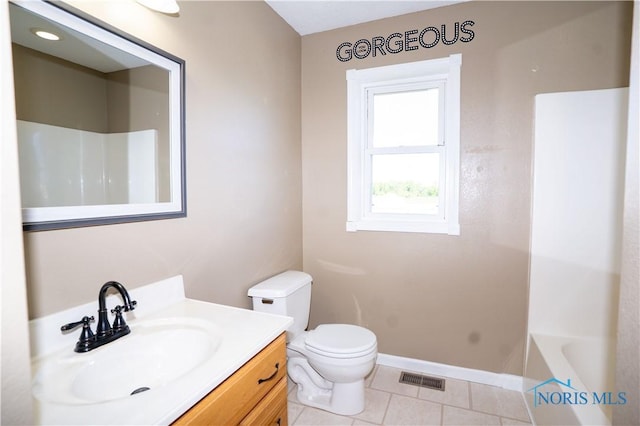 1500 S Jackson Ave, Defiance, OH 43512 - bathroom featuring vanity, toilet, tile patterned flooring, and baseboards