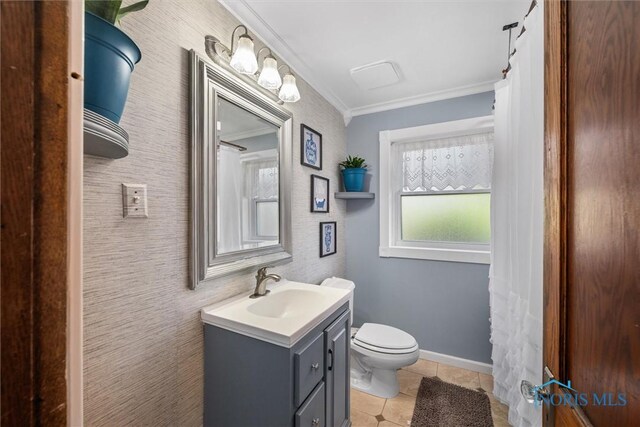 451 Toledo St, Elmore, OH 43416 - bathroom with crown molding, vanity, toilet, and tile patterned floors