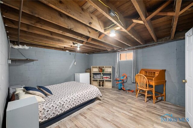 451 Toledo St, Elmore, OH 43416 - bedroom with wood finished floors, washer / clothes dryer, and fridge