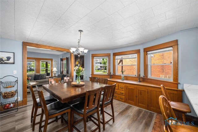 451 Toledo St, Elmore, OH 43416 - dining area with dark wood finished floors and a chandelier