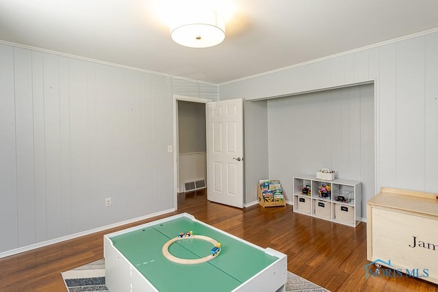 717 Birch St, Bowling Green, OH 43402 - recreation room featuring wood finished floors, crown molding, and baseboards