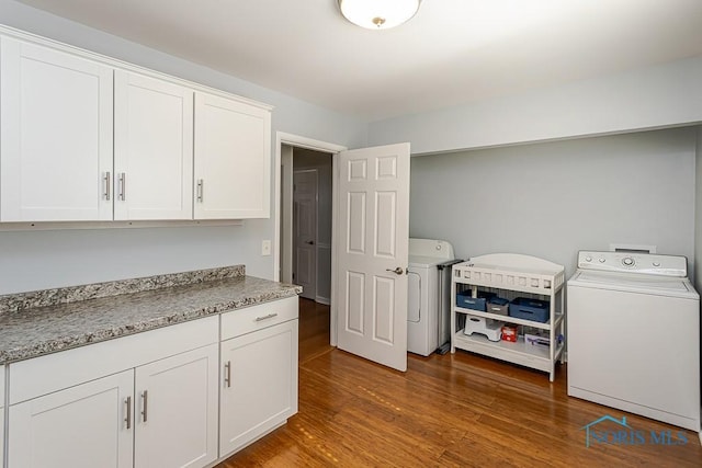 717 Birch St, Bowling Green, OH 43402 - washroom featuring washer / dryer and wood finished floors