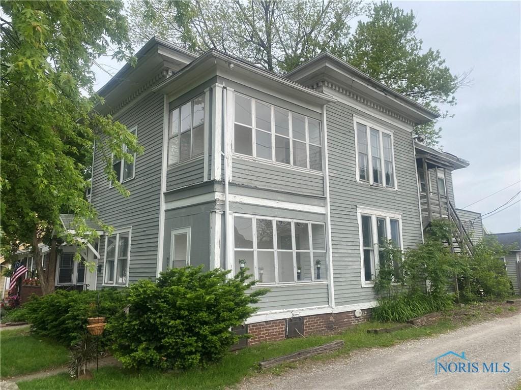 1016 Mallett St, Toledo, OH 43612 - view of home's exterior featuring crawl space