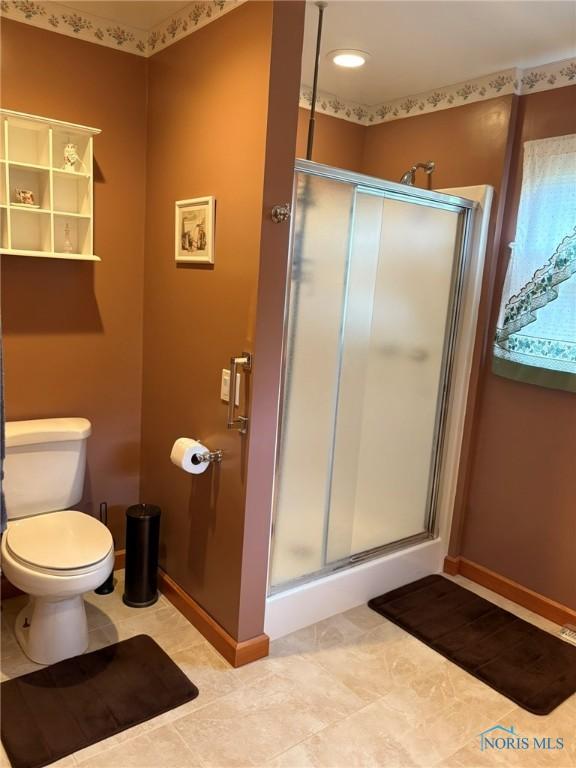 243 W S Boundary St, Perrysburg, OH 43551 - full bath with a shower stall, toilet, baseboards, and recessed lighting
