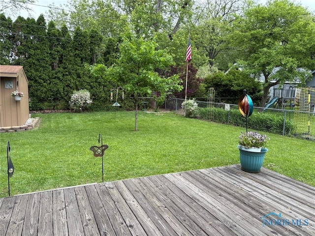 243 W S Boundary St, Perrysburg, OH 43551 - wooden terrace featuring a playground