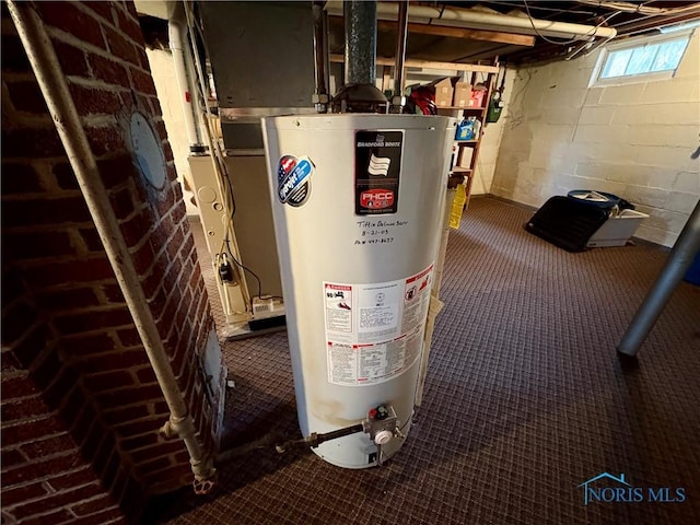 178 Gross St, Tiffin, OH 44883 - utility room featuring water heater