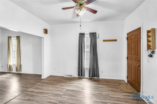 358 Burger St, Toledo, OH 43605 - empty room featuring ceiling fan, wood finished floors, and a textured ceiling