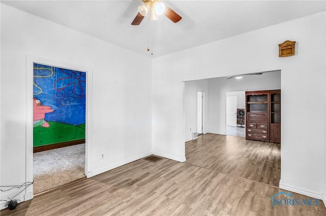 358 Burger St, Toledo, OH 43605 - unfurnished room with wood finished floors and a ceiling fan