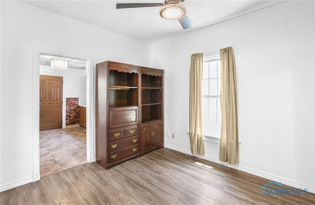 358 Burger St, Toledo, OH 43605 - unfurnished room with ceiling fan and wood finished floors