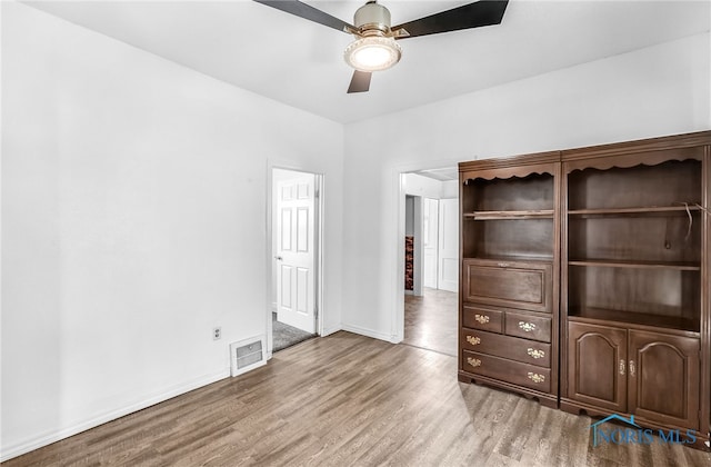 358 Burger St, Toledo, OH 43605 - unfurnished bedroom featuring light wood-type flooring and a ceiling fan