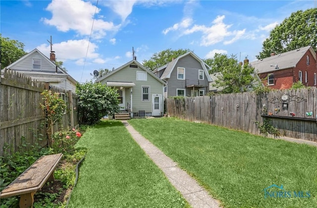 358 Burger St, Toledo, OH 43605 - rear view of property featuring a fenced backyard