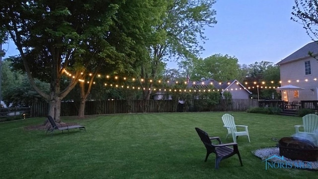 6200 Swiss Garden Rd, Toledo, OH 43612 - view of yard featuring an outdoor fire pit and a deck
