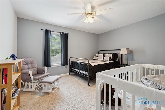 6200 Swiss Garden Rd, Toledo, OH 43612 - carpeted bedroom featuring ceiling fan and baseboards