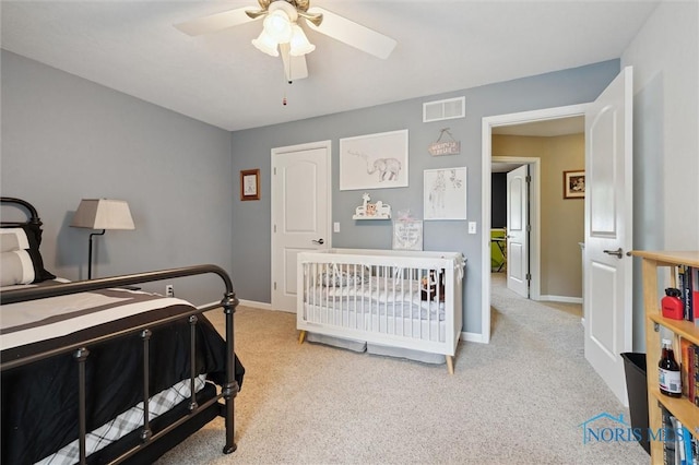 6200 Swiss Garden Rd, Toledo, OH 43612 - bedroom featuring light carpet, baseboards, and a ceiling fan