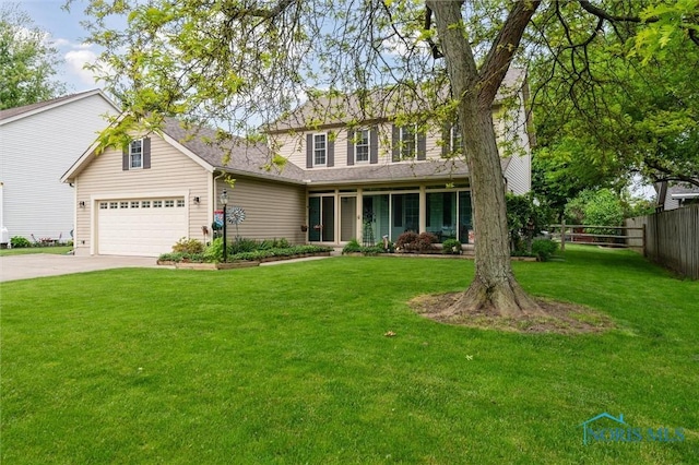 6200 Swiss Garden Rd, Toledo, OH 43612 - traditional-style home with concrete driveway and a garage