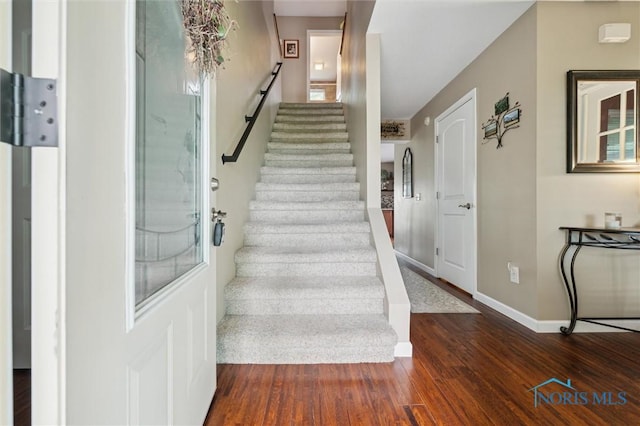 6200 Swiss Garden Rd, Toledo, OH 43612 - stairs featuring wood finished floors and baseboards