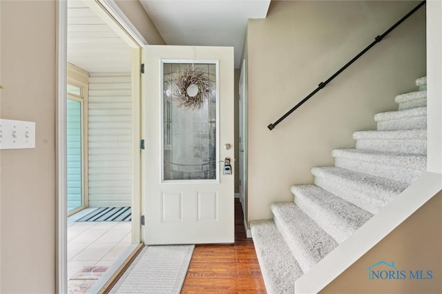 6200 Swiss Garden Rd, Toledo, OH 43612 - foyer entrance with stairs and wood finished floors