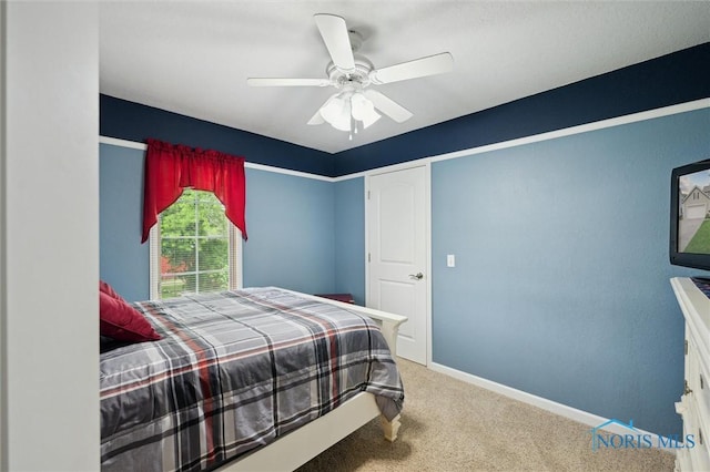6200 Swiss Garden Rd, Toledo, OH 43612 - bedroom featuring carpet floors, baseboards, and a ceiling fan
