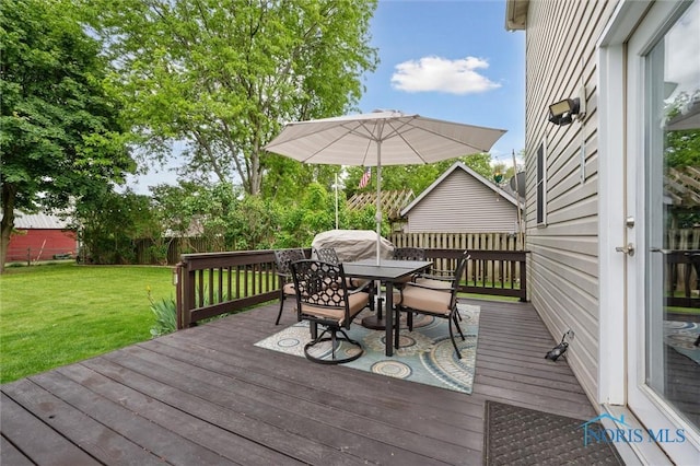 6200 Swiss Garden Rd, Toledo, OH 43612 - wooden terrace featuring outdoor dining space and a yard