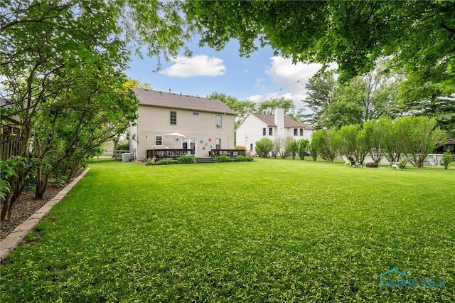 6200 Swiss Garden Rd, Toledo, OH 43612 - rear view of house with a deck and central air condition unit