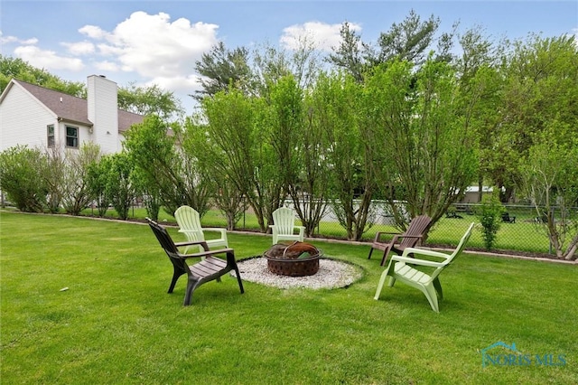 6200 Swiss Garden Rd, Toledo, OH 43612 - view of yard featuring an outdoor fire pit