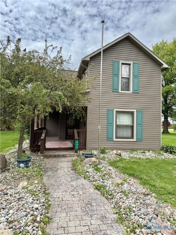 429 N Park St, Deshler, OH 43516 - view of front of house with covered porch and a front yard