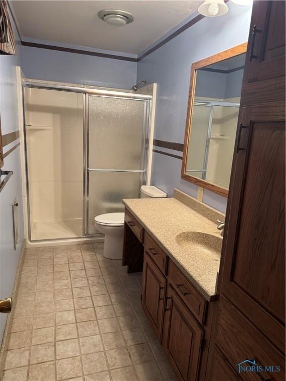 429 N Park St, Deshler, OH 43516 - bathroom featuring vanity, a shower stall, and ornamental molding