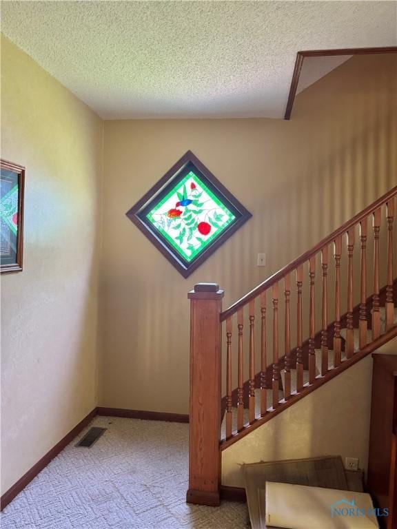 429 N Park St, Deshler, OH 43516 - stairway with a textured ceiling and carpet floors