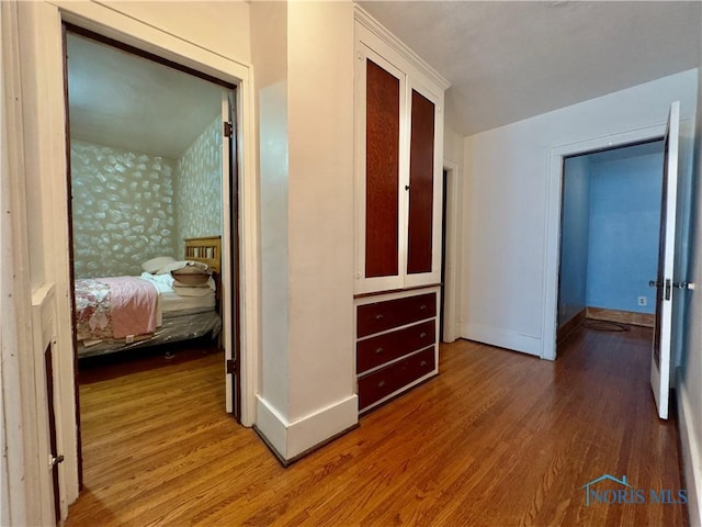 2135 Airport Hwy, Toledo, OH 43609 - hallway featuring baseboards and wood finished floors