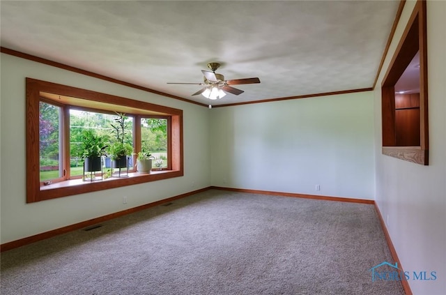 2534 Blanchard Ave, Findlay, OH 45840 - carpeted spare room with ceiling fan, baseboards, and ornamental molding