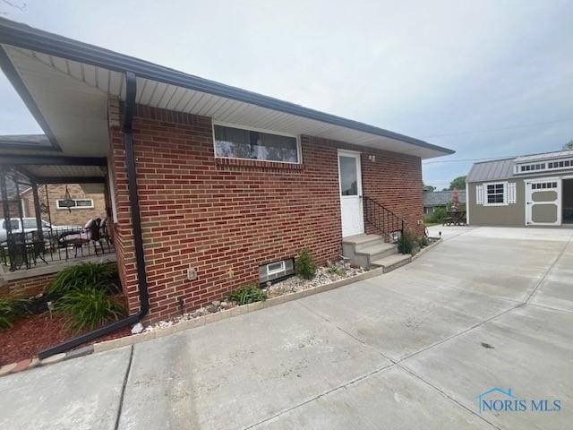 4448 Helmond Ct, Toledo, OH 43611 - exterior space with brick siding and entry steps