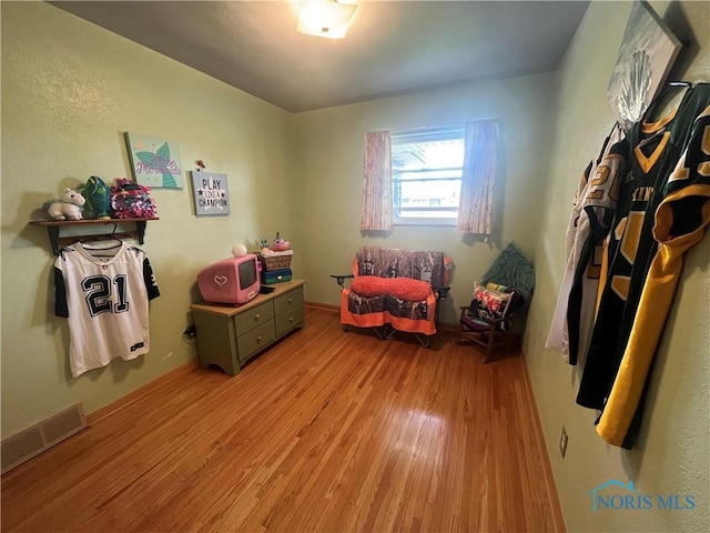 4448 Helmond Ct, Toledo, OH 43611 - rec room featuring light wood-style floors and baseboards