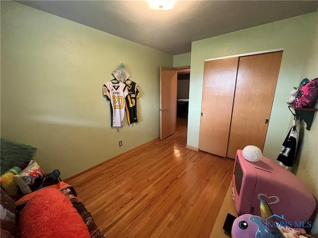 4448 Helmond Ct, Toledo, OH 43611 - rec room with light wood finished floors