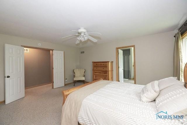 1033 Joseph Rd, Luckey, OH 43443 - bedroom featuring light colored carpet, ceiling fan, and baseboards